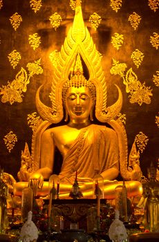 Golden buddha statue image in Phare Temple Thailand