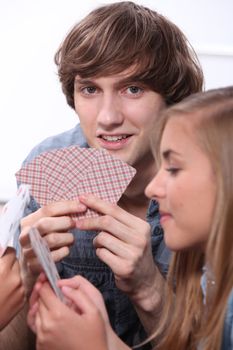 Young people playing cards