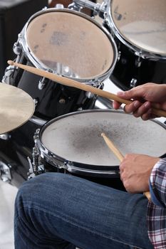 man playing drums