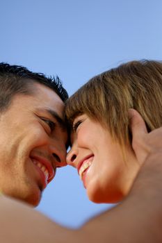 Affectionate couple stood outdoors