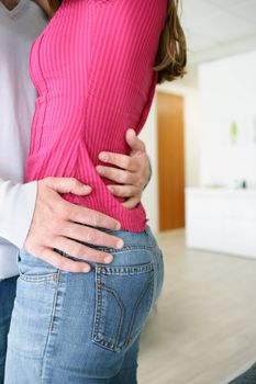 Cropped couple hugging