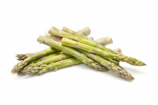 freshly harvested wild asparagus on white background