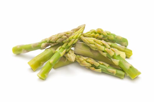 freshly harvested wild asparagus on white background