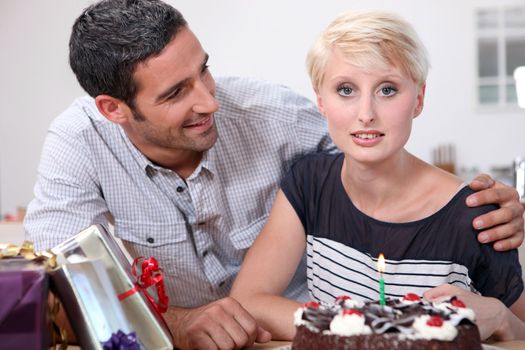 man celebrating girlfriend's birthday