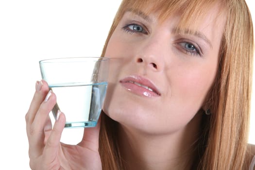 Woman with a glass of water