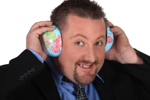 Man using the world as a pair of ear defenders