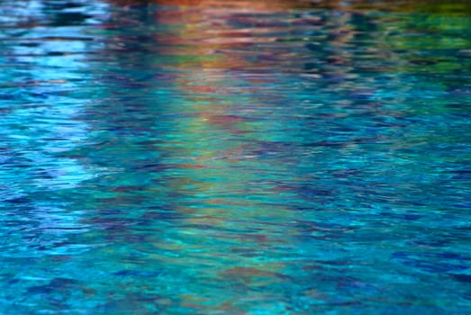 Colorful  reflections of pool water. abstract pattern background.