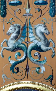 Medieval ornaments of two heraldic sea fads