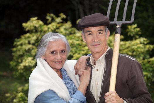 Senior gardening couple