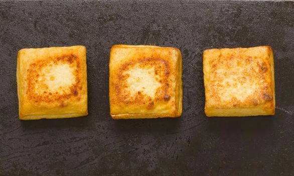 close up of fried tofu cubes