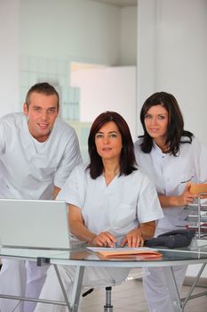 Dental team at a laptop