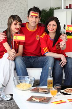 Group of friends supporting the Spanish football team