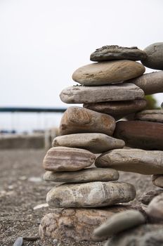 Philosofy nature stone on sea shore closeup