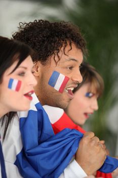 Three French football fans