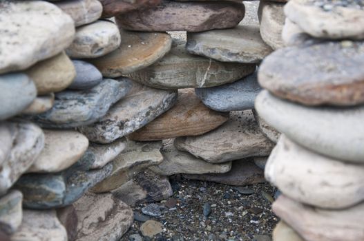 Philosofy nature stone on sea shore closeup