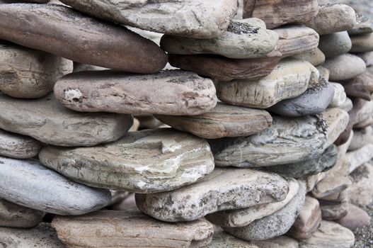 Philosofy nature stone on sea shore closeup