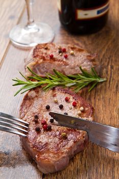 grilled meat fillet on wooden background