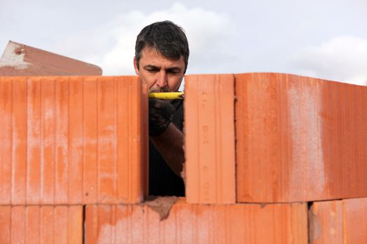 An assiduous bricklayer