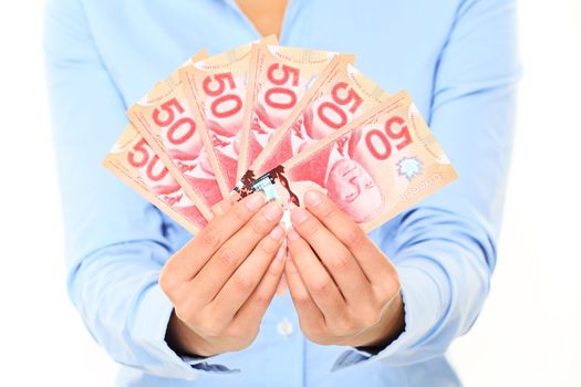 Canadian dollars money bills. 50 dollars note Canadian dollar bills. Business woman holding canadian fifty dollars bills closeup.