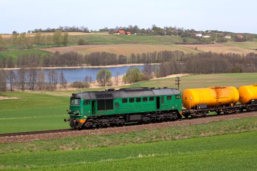 Freight train passing the countryside
