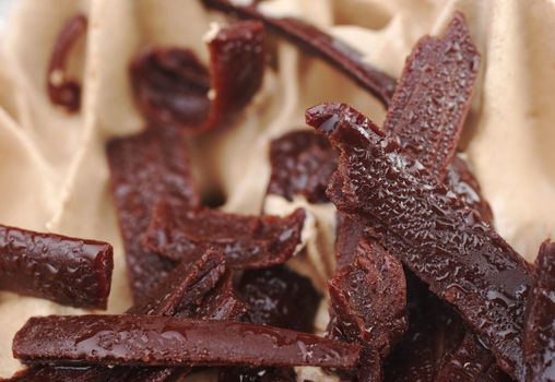 Closeup of chocolate shavings on chocolate cake (Selective Focus) 