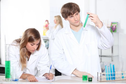 portrait of two students in a lab
