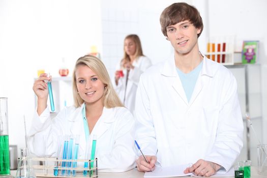 young woman and young man in a laboratory