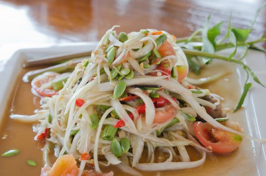 close up of spicy papaya salad  and fresh vegetable 