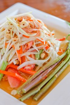 favorite Thai cuisine , spicy papaya salad with peanut and vegetable