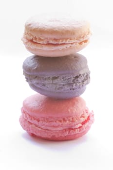 macaroons stacked on white background