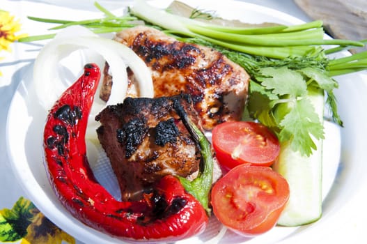 Vegetables cooked on the grill in the garden