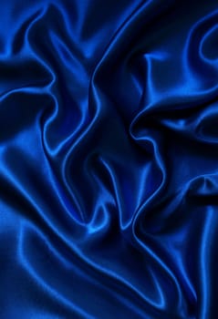 Smooth elegant blue silk as background