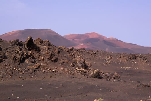 Barren land in Timanfaya national park on volcanic island Lanzarote, Canary Islands
