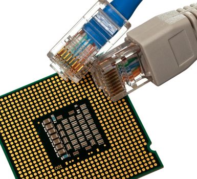 Macro shot of plugs on cat5e cables of many colors isolated against white background on top of exposed CPU chip