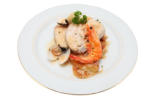 dish of hake cooked potatoes with prawns and clams onion parsley cut off and isolated