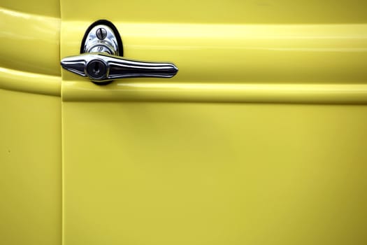Classic yellow car door.