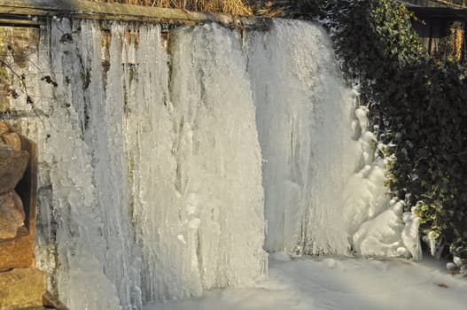 Vertically frozen water in hard winter in park