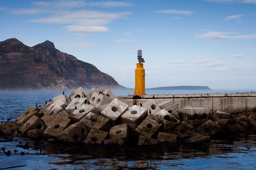 Breakwater and light in Hout Bay, South Africa