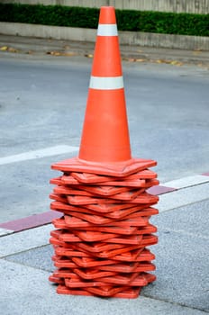 Traffic cone on the foot path.