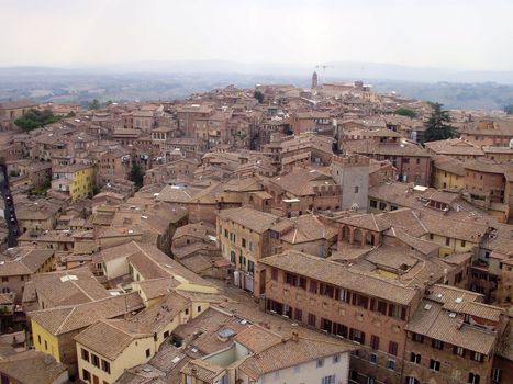 The Medieval cityscape of Siena, Italy located in Tuscany.