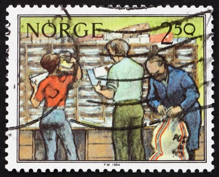 NORWAY - CIRCA 1987: a stamp printed in the Norway shows Sorting Letters, Postal Service, circa 1987
