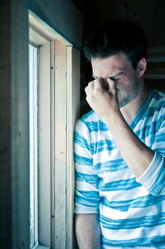 Young man at the window