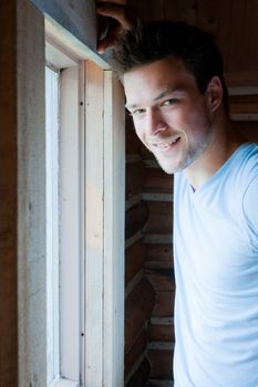 Young man at the window