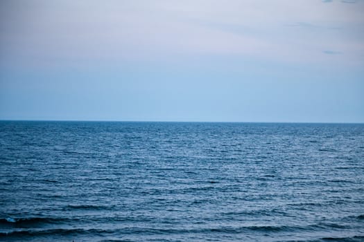 Horizon of sea and the blue sky of the evening