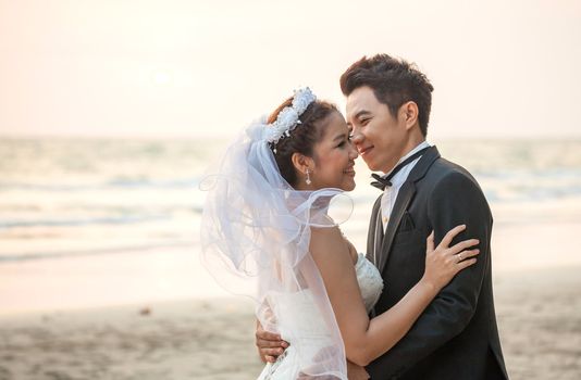 happiness and romantic Scene of love couples partners wedding on the Beach