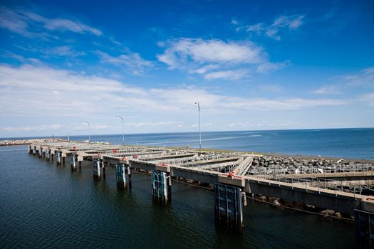 View of pier and the port on a sunny day of summer