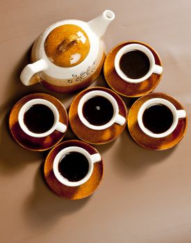 still life of coffee cups and coffeepot