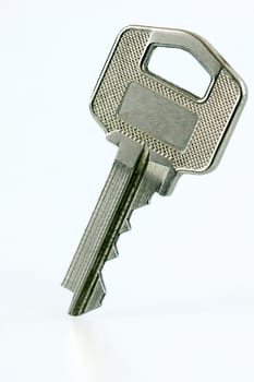 Closeup of a silver house key