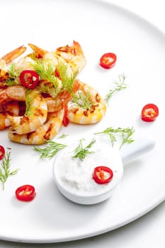 grilled prawns with dip of garlic, chilli and dill