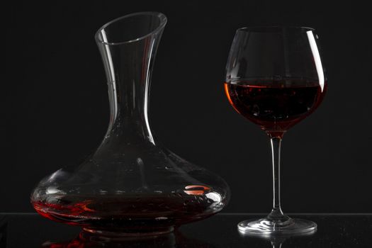 wine glass and carafe with red wine